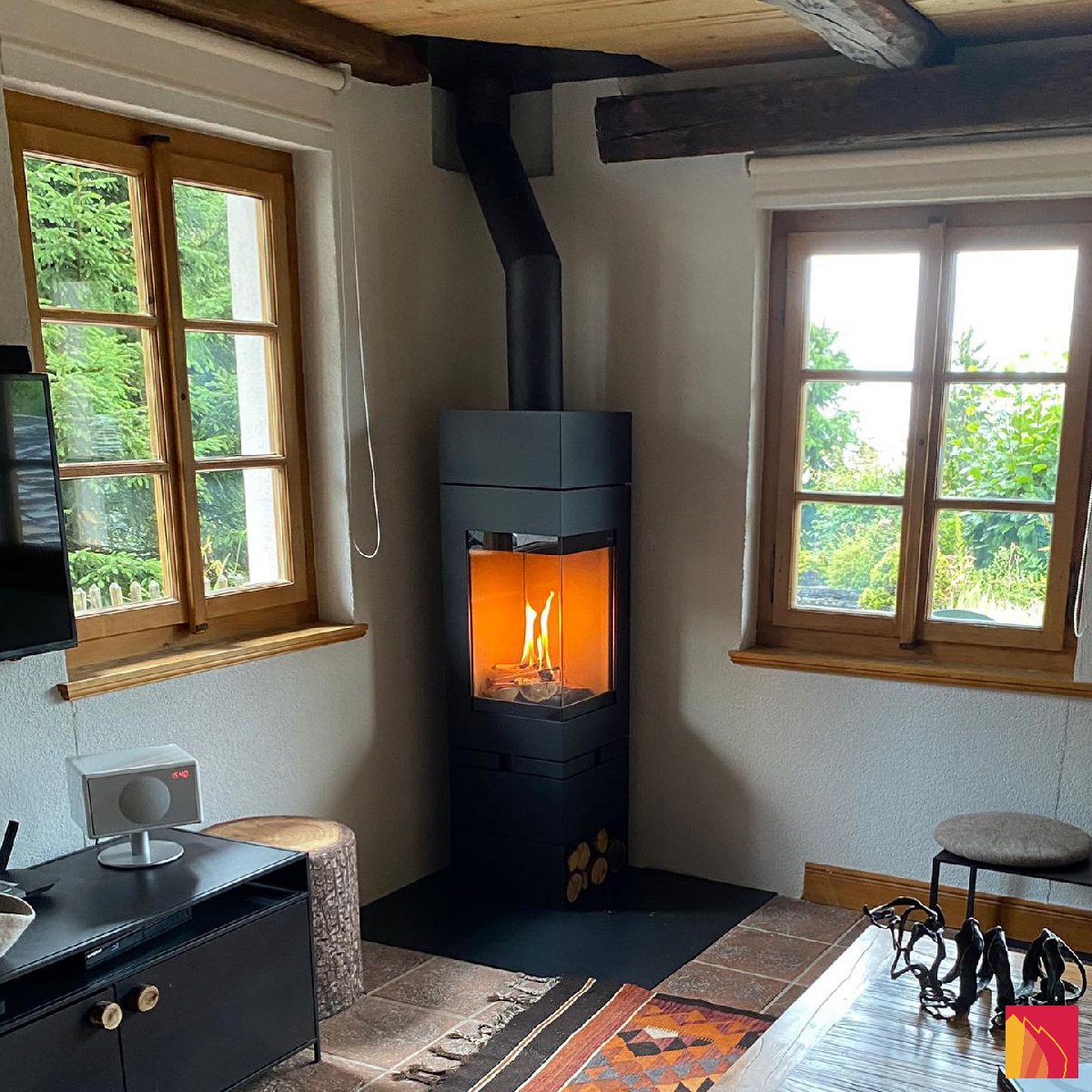 Estufa de leña Skantherm Elements 400 ángulo - Carron-Lugon